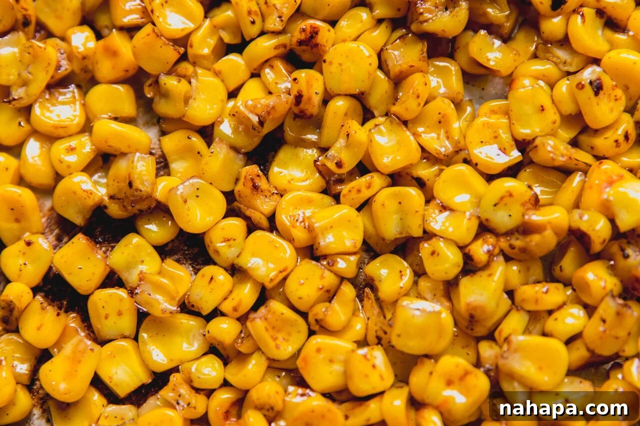 Mexican Street Corn Chicken Salad Recipe for Summer BBQs 5 Corn sauting in a pan.